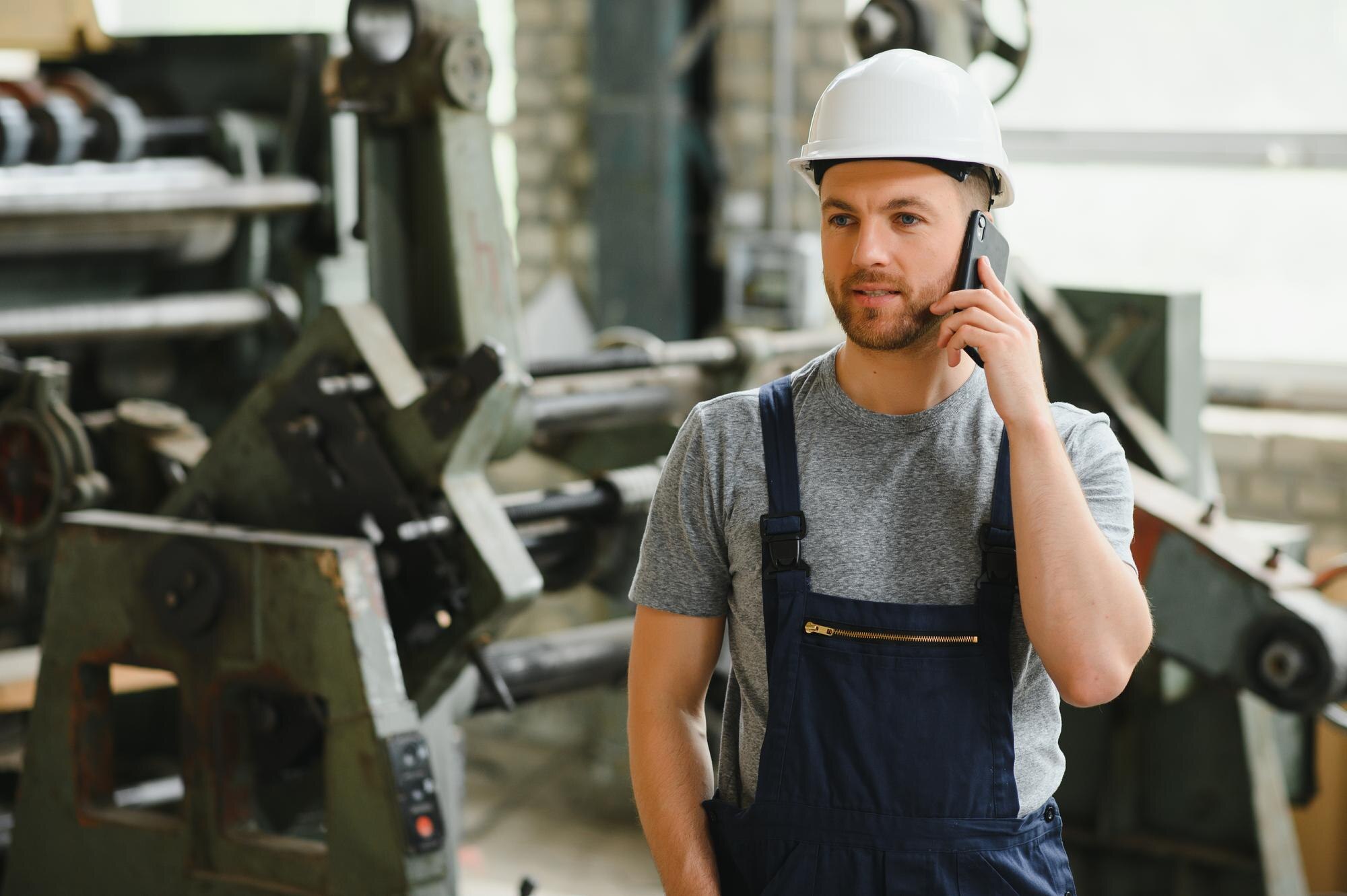 management team engineer foreman standing checking job information about industrial production manag